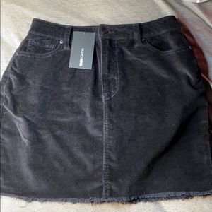 Black corduroy mini skirt